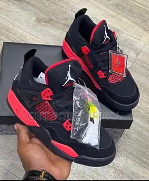 Air Jordan 4 Unisex Sneakers Red in Color