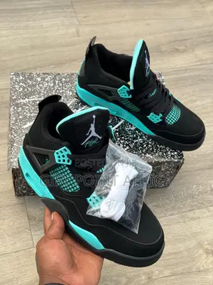 Air Jordan 4 Unisex Sneakers Light Blue in Color