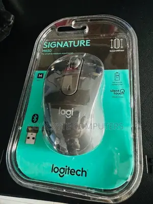 ^ Logitech Signature M650 Wireless Mouse