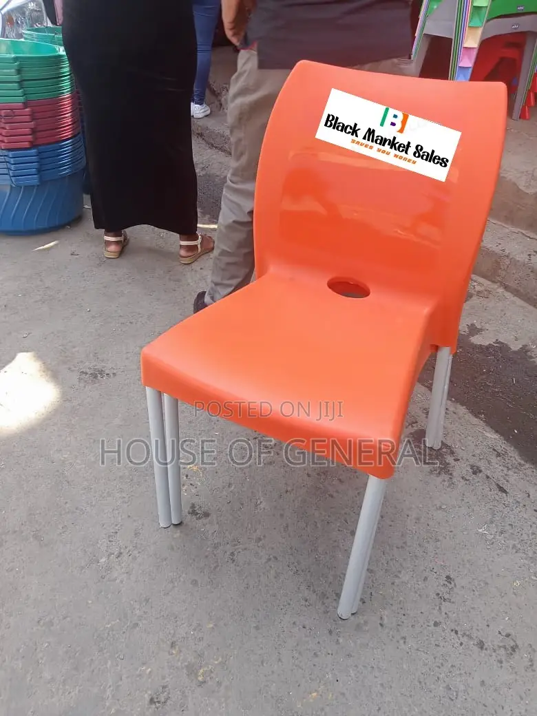 Armless Plastic Chair With Metal Tubing Legs