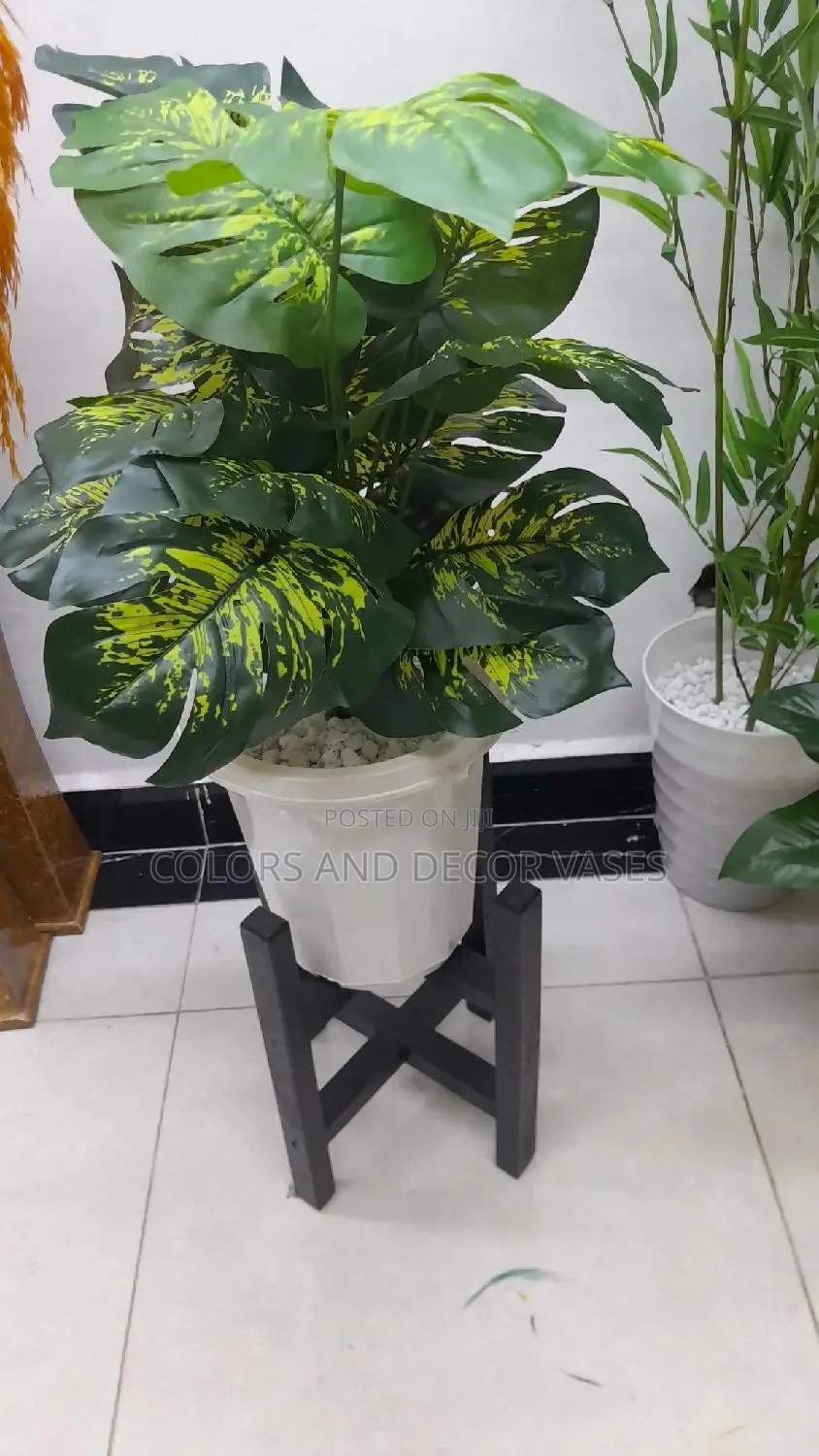 Artificial Plant, Black Stand and Plastic Vase