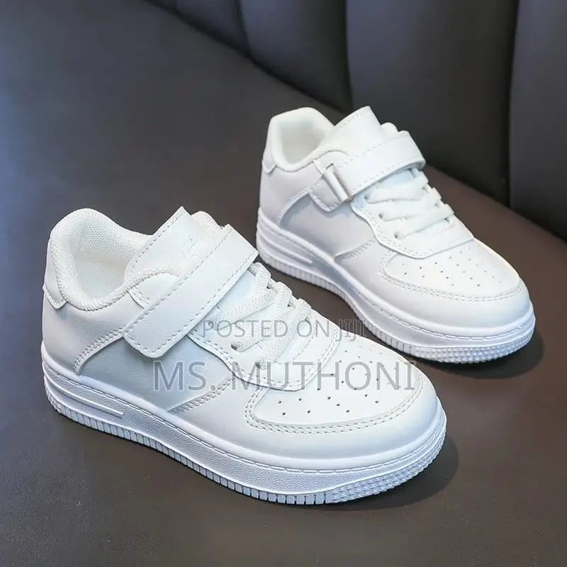 *Kids White Sneakers/Maziwa* *Sizes : 21_____36*