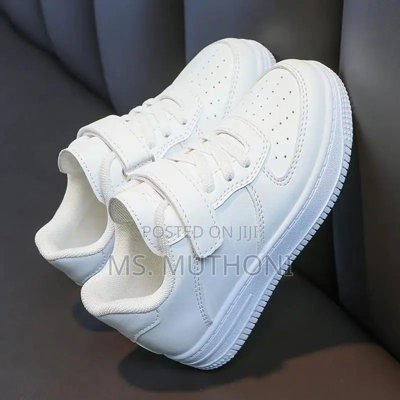 *Kids White Sneakers/Maziwa* *Sizes : 21_____36*