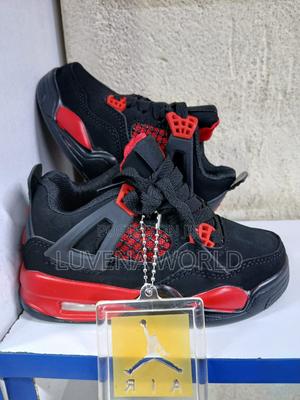 Kids Jordan 4s - thumbnail 2
