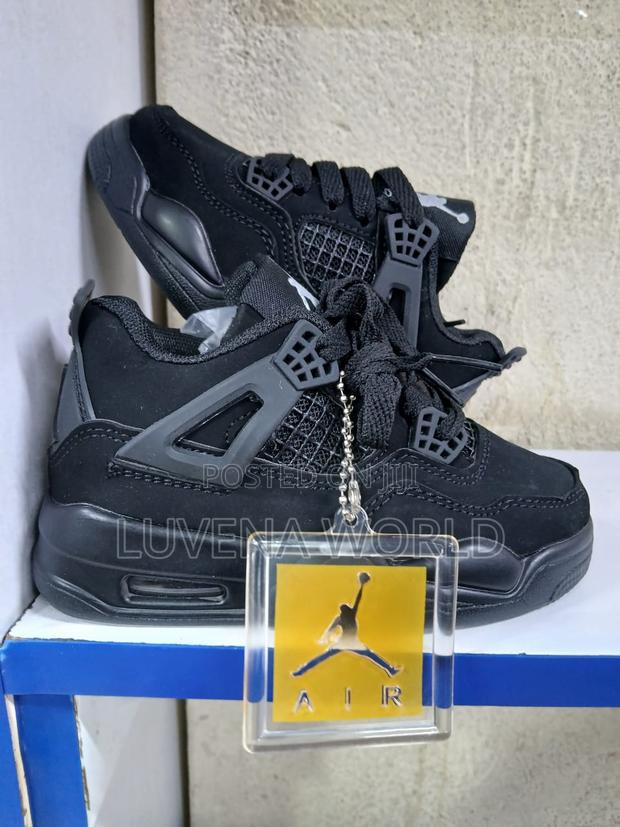 Kids Jordan 4s - thumbnail 3