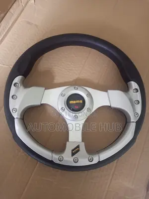 Quality Momo Silver Steering Wheel Sports