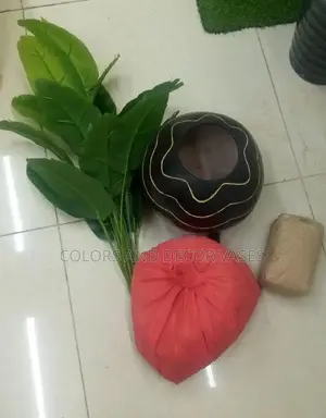 Banana Plant, Calabash and White Stones