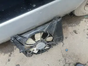 Mazda Demio Radiator Guard and Fan