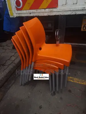 Armless Plastic Chair With Metal Tubing Legs