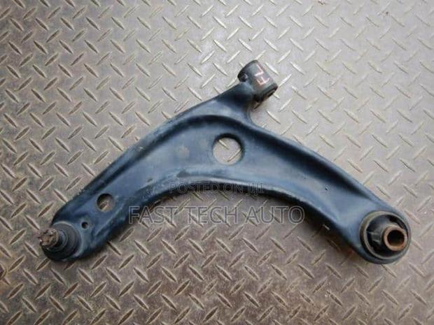 Front Arms Belta, Ractis, Vitz