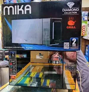 Brand New Mika Microwave With Grill