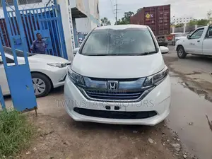 White 2017 Honda Freed - Spacious and Efficient Family Vehicle