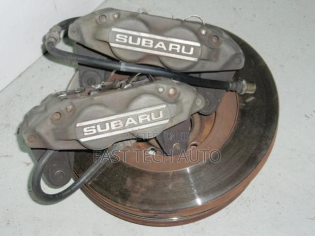 Subaru 4 Pot Brake Calipers and Disc - main view