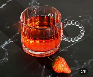 Luxury Borosilicate Glass Cup With Pearl Like Handle.
300ml