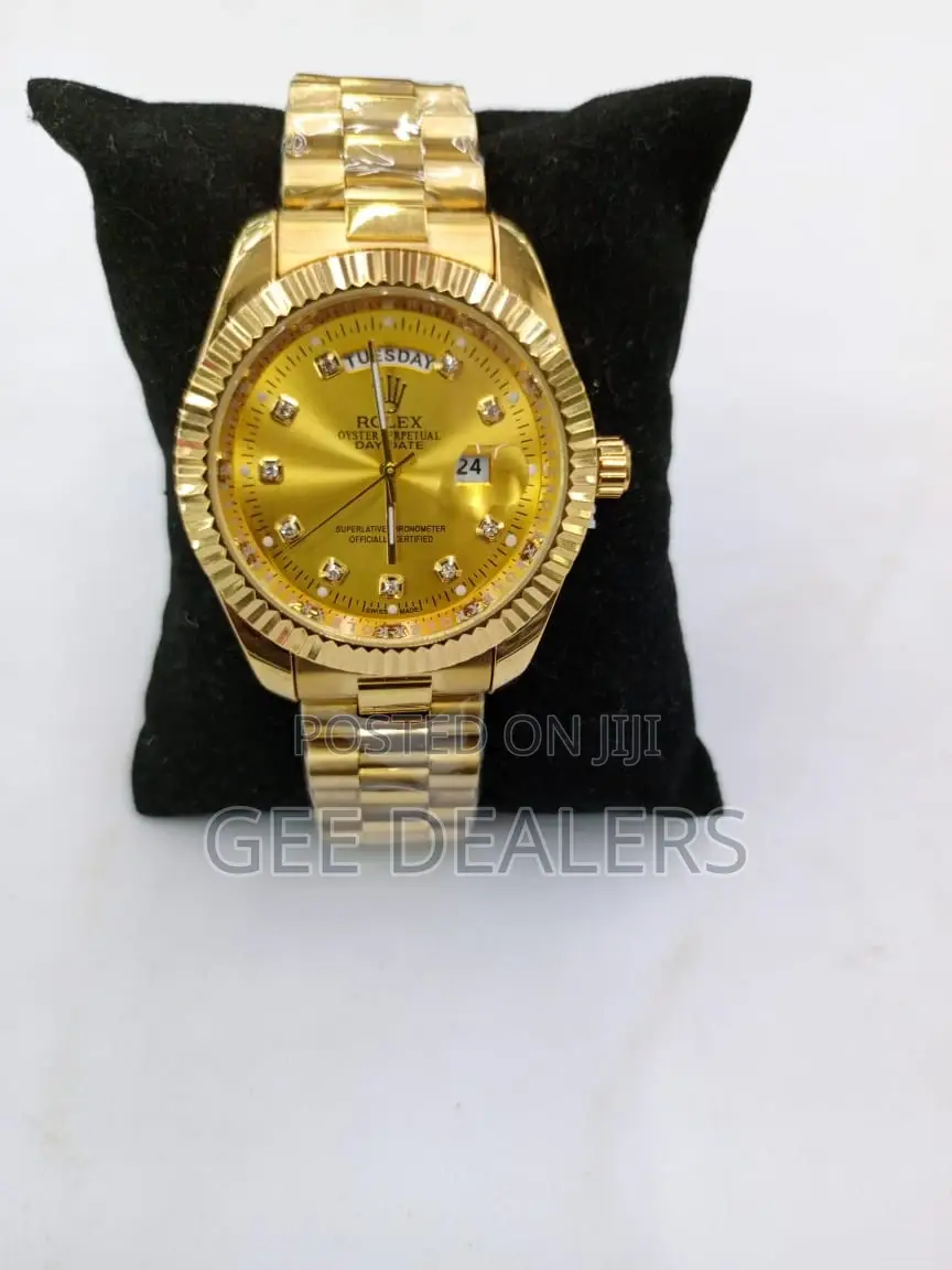 Rolex Wrist Watch .Gold Colour