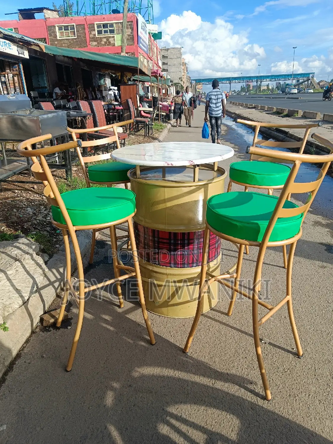 Bar Set of 4 Chairs and a Drum Table.