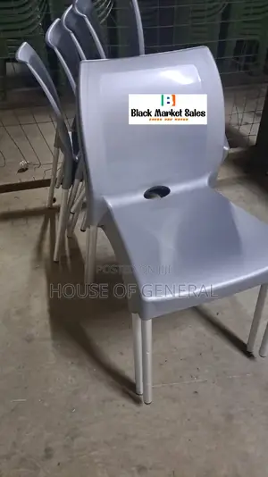 Gray Armless Plastic Chair With Metal Legs
