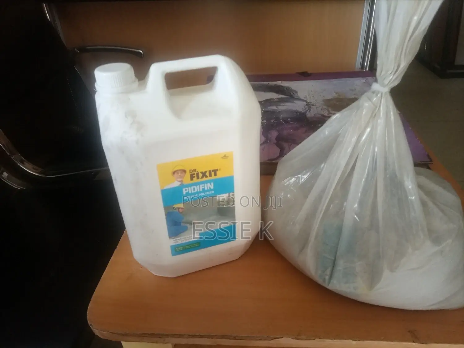Dr. Fixit Pidifin Acrylic Waterproof Coating.