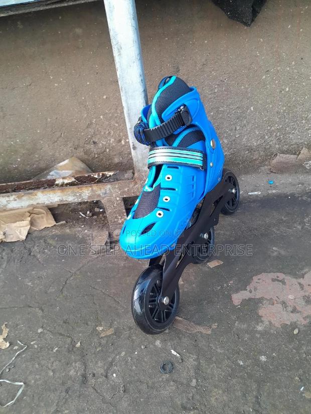 Blue Skate Shoes With Rubber Wheels