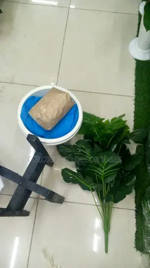 Wooden Stand,Plant Artificial and Plastic Vase With Pebbles