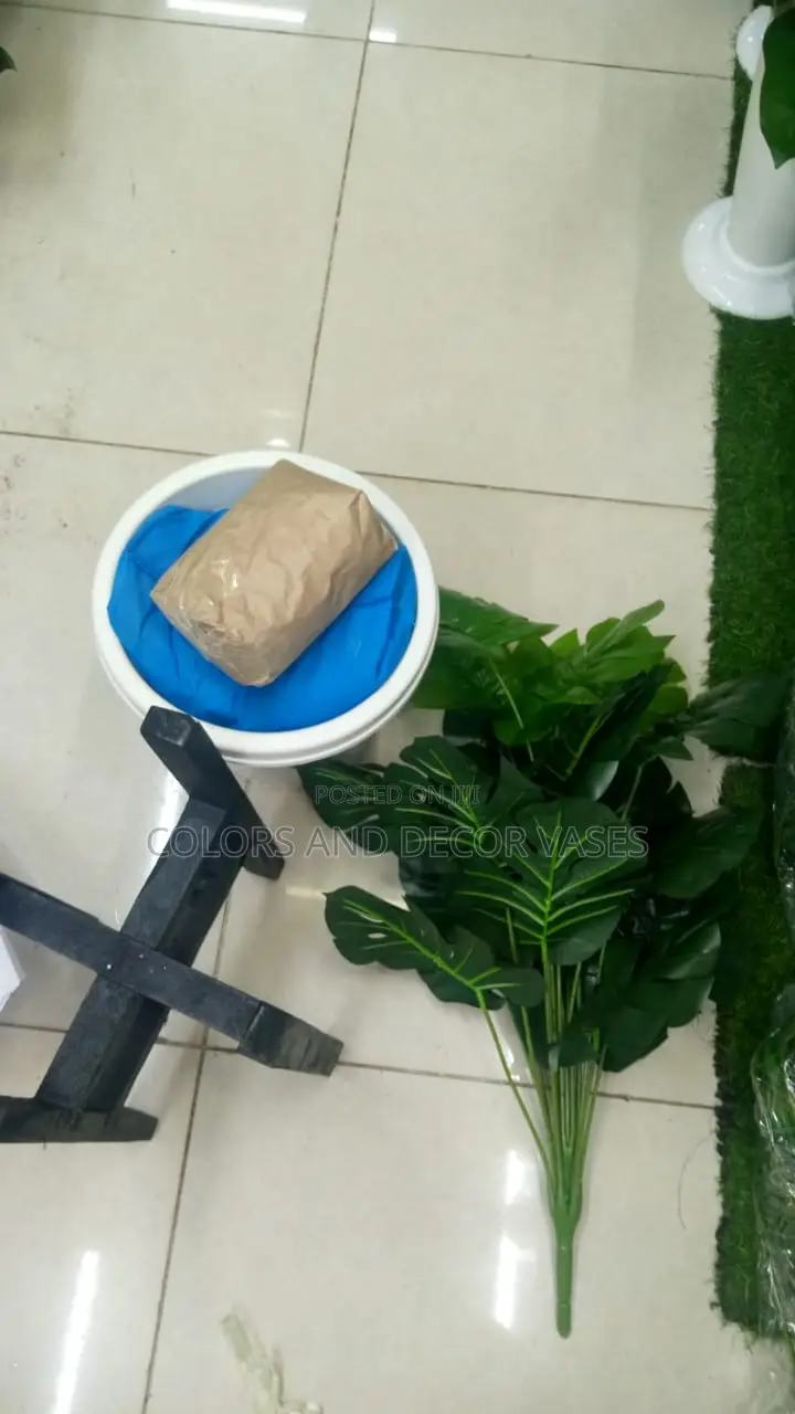 Wooden Stand,Plant Artificial and Plastic Vase With Pebbles