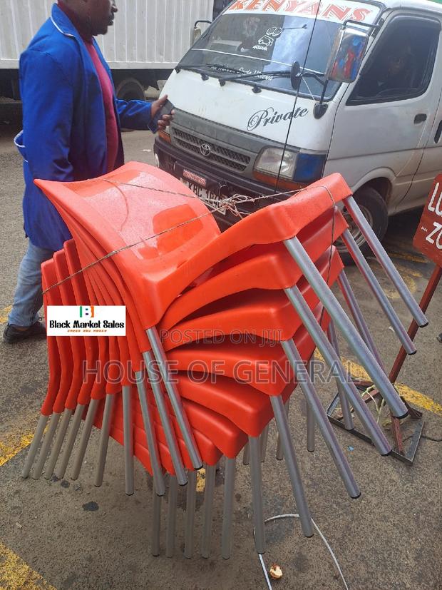 Red Armless Plastic Chair