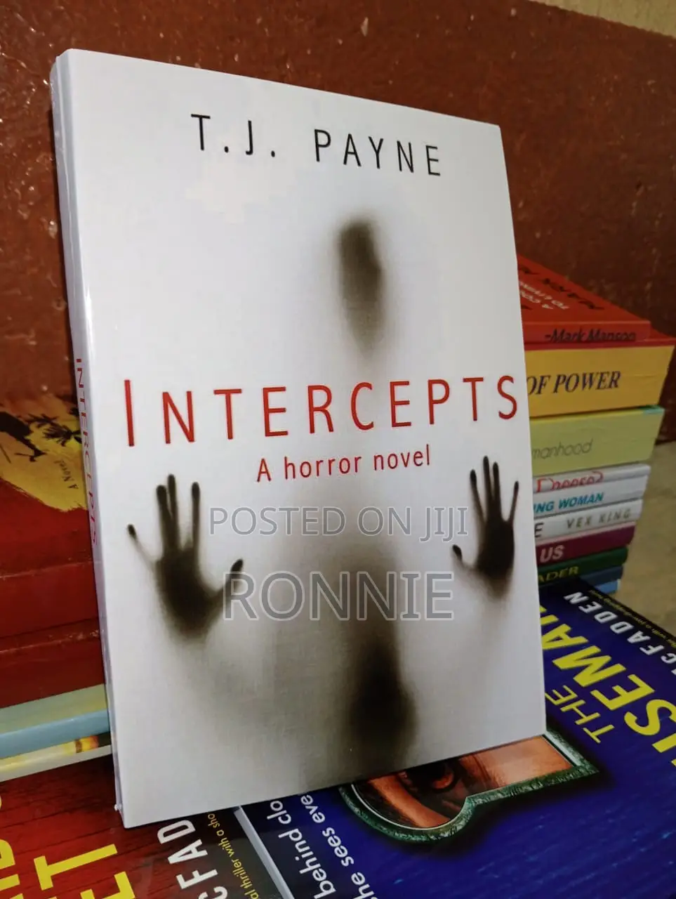 Intercepts: A Horror Novel Novel by T. J. Payne