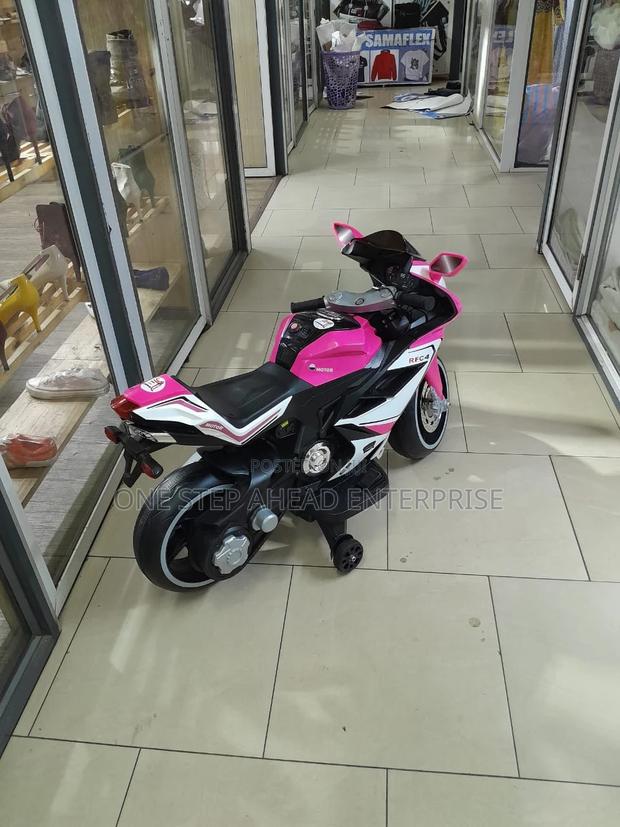 Kids Riding on Electric Bike in Nairobi Central