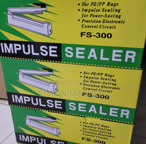 FS 300 Sealer Machine. Metal Body.