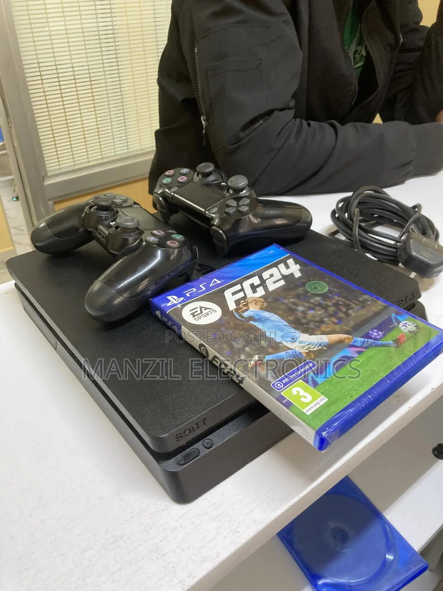 PS4 Slim With 2 Pads and Fc24 in Nairobi Central Video Game Consoles