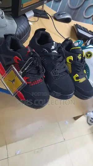 Kids Jordan 4 Sneakers