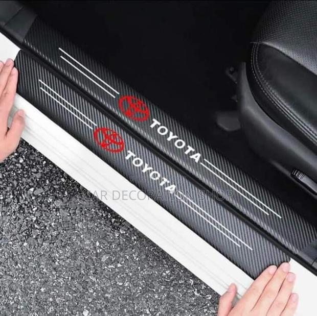 Toyota Car Door Fitted With Branded Carbon Finish Sticker
