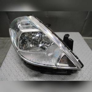 Headlight Nissan Tiida - main view