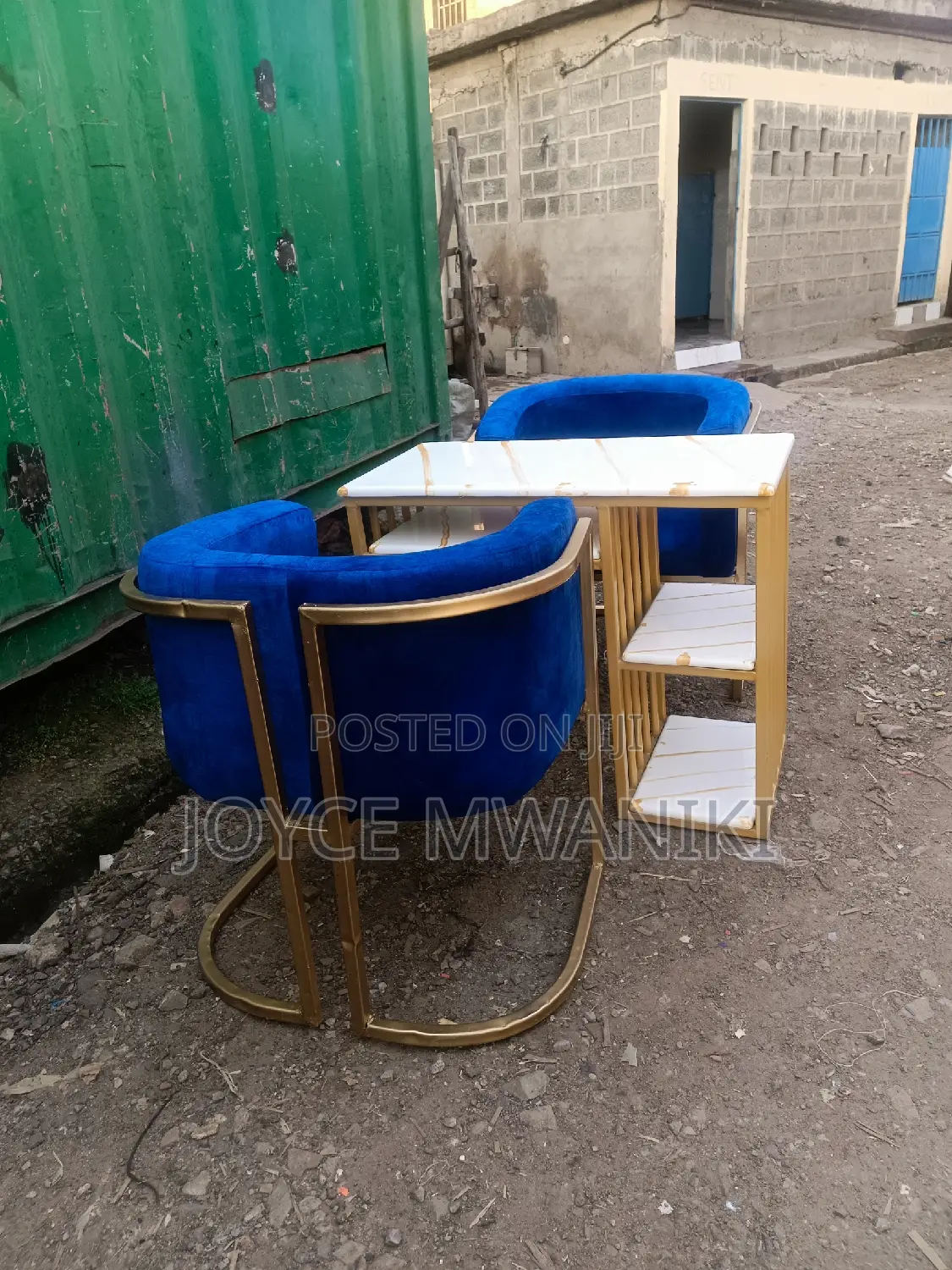 Manicure Set, Marble Table and Blue Seats.