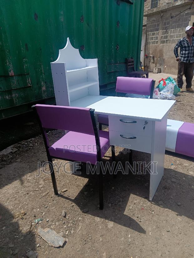 Manicure Set, Purple Seats and a White Table - main view