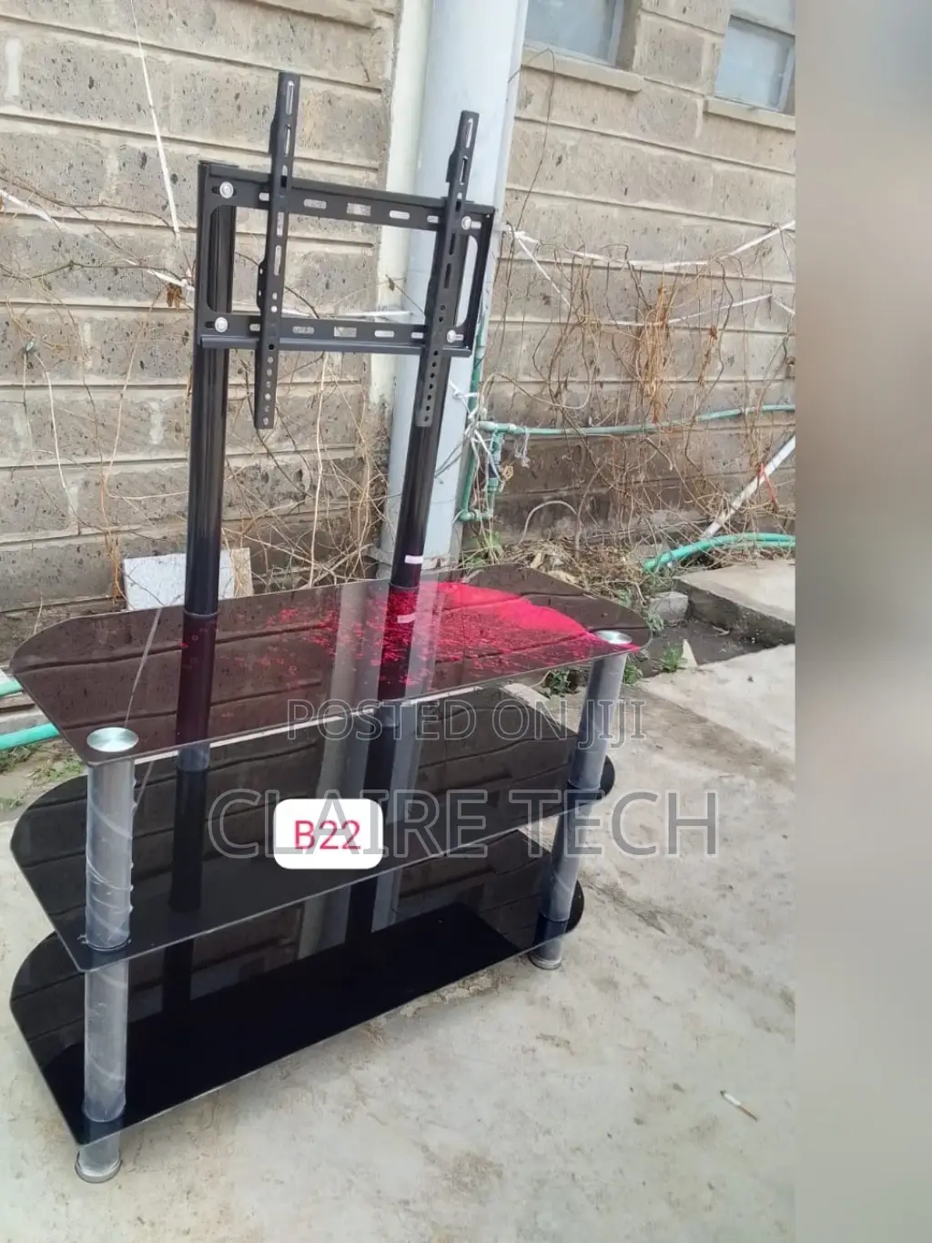 Black Executive Glass Tv Stand With Tv Bracket.