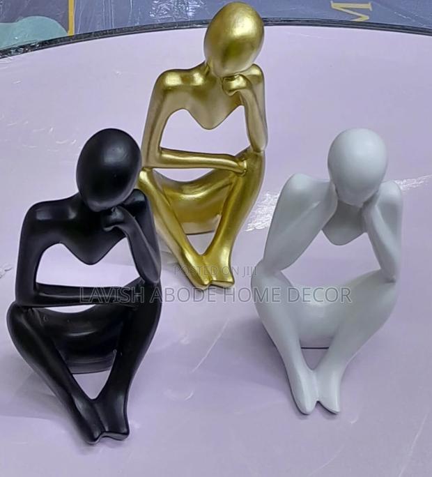 Thinking Man Statues