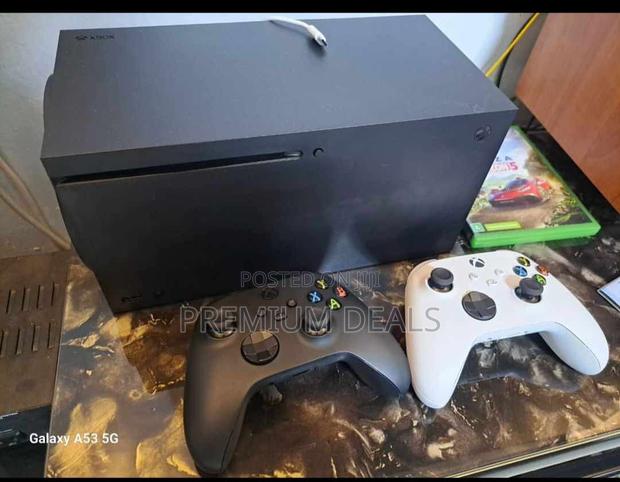 Xbox Series X With Two Controllers. - main view