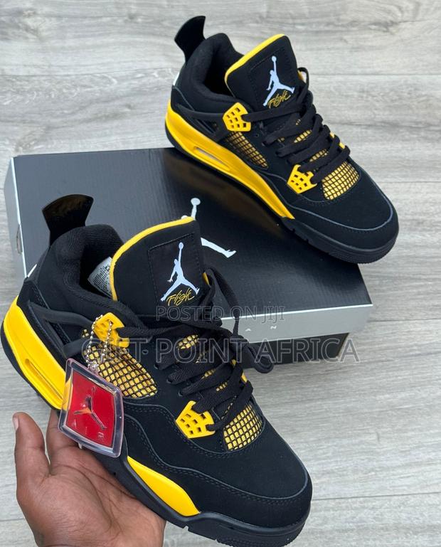 Air Jordan 4 Sneakers - thumbnail 3