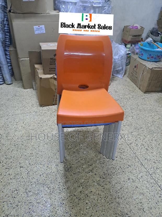 Armless Plastic Chair With Metal Tubing Legs