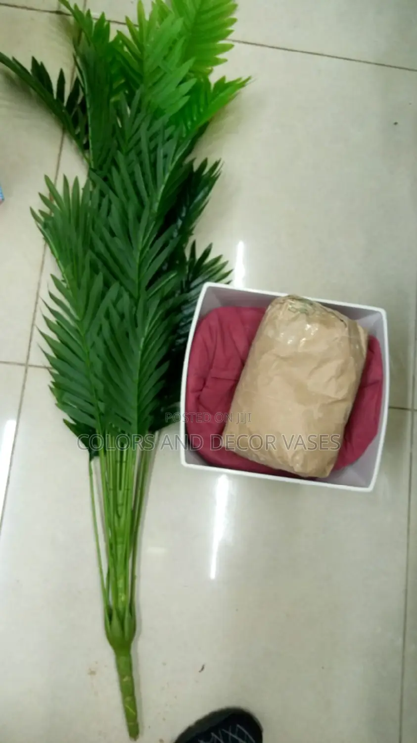 Palm Tree,Plastic Vase and Pebble Stones
