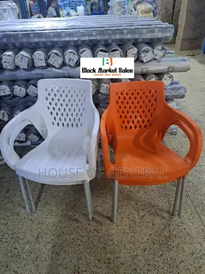 Orange and White Plastic Chair With Metal Legs