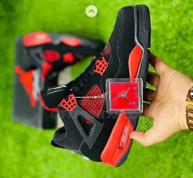 Jordan 4 Thunder Red Sneakers - thumbnail 2