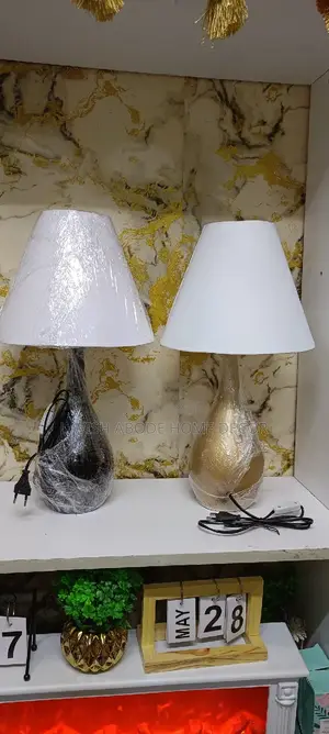 Gold Table Lamp With a Glass Base