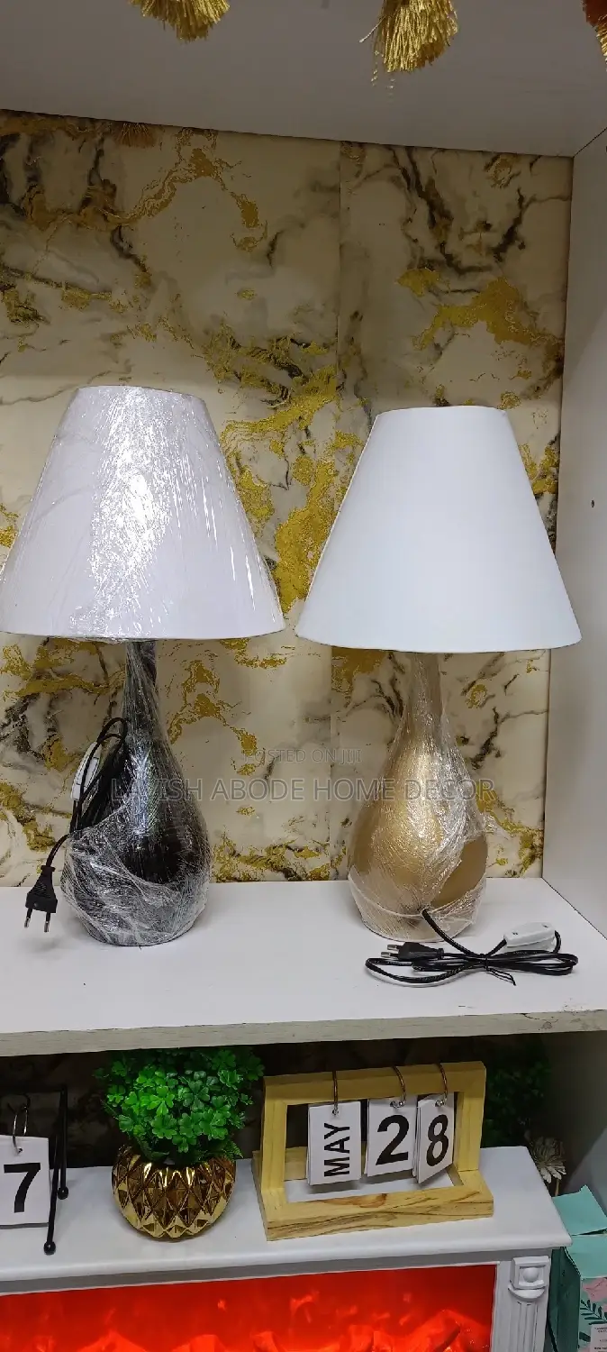 Gold Table Lamp With a Glass Base