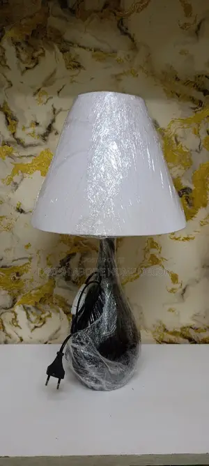 Black and White Bedside Table Lamp With a Glass Base