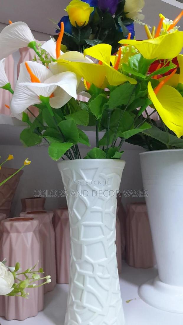 Plastic Vase and Flowers Lilies