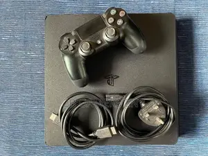 Play Station 4 Slim, Home Used, Slightly