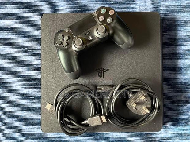 Play Station 4 Slim, Home Used, Slightly