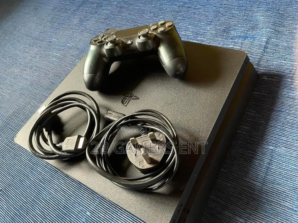 Play Station 4 Slim, Home Used, Slightly